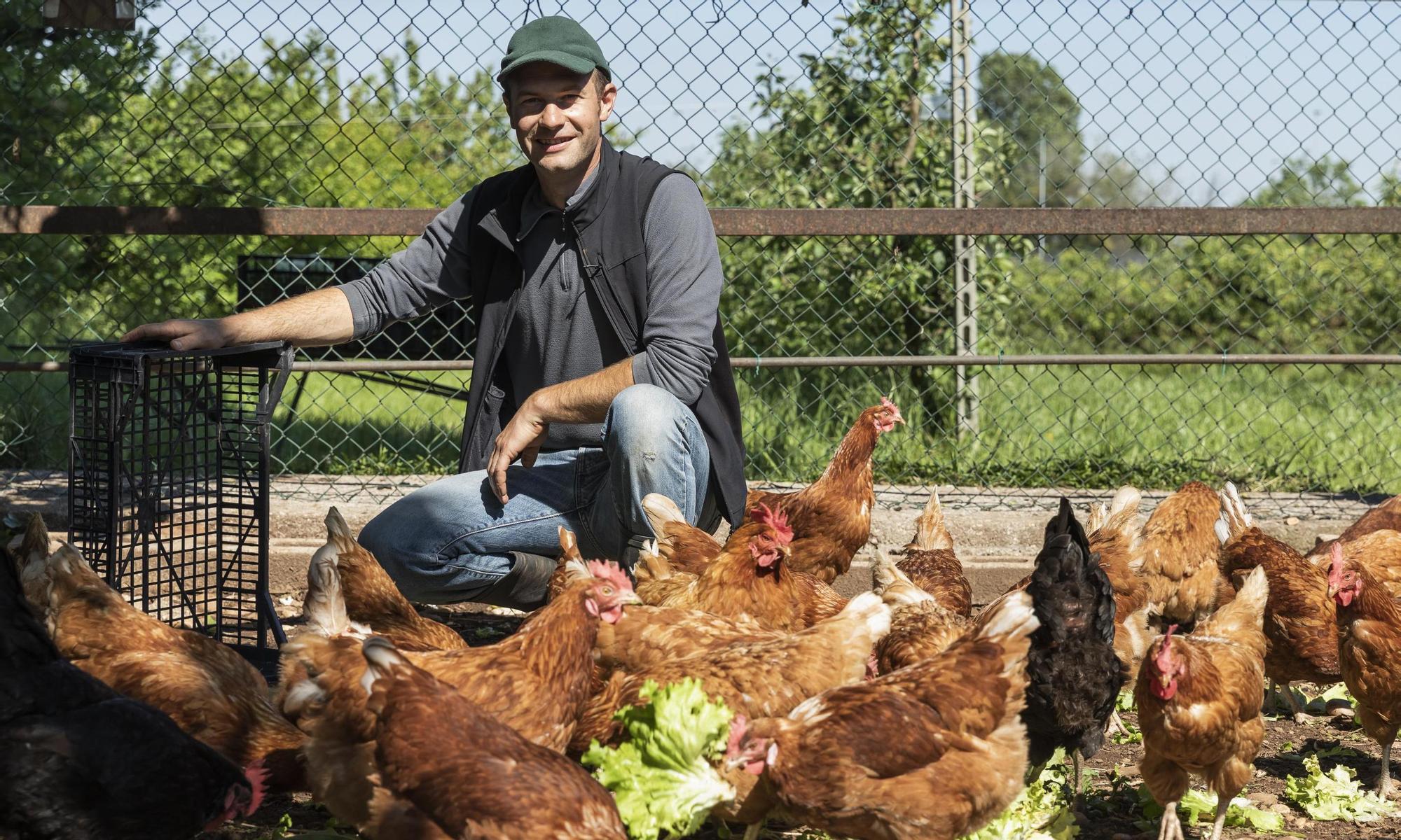 A farmer with his chickens 